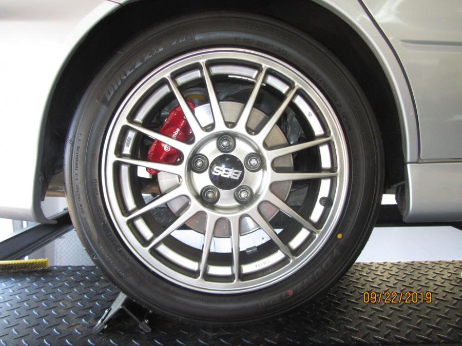 Колеса Mitsubishi Lancer Evolution IX MR 2006 года  (фото 34 из 69)